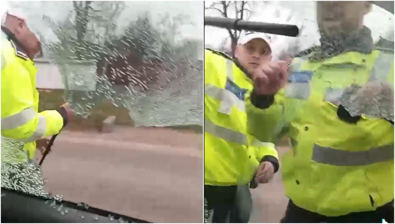 Imagini cu momentul în care Poliția îi sparge geamul mașinii unui șofer care nu a vrut să coboare din autovehicul
