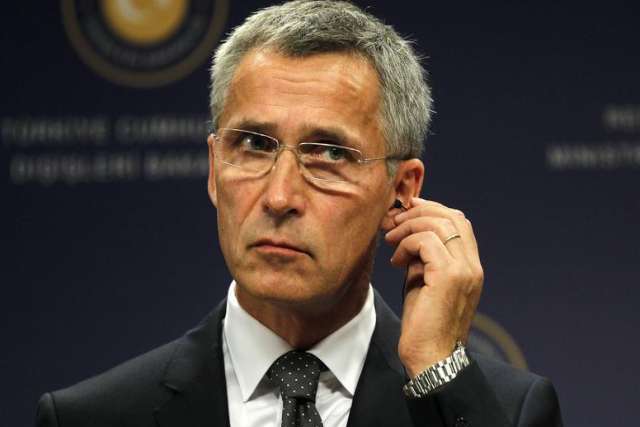 NATO și Germania exclud un răspuns militar în cazul unei agresiuni a Rusiei împotriva Ucrainei