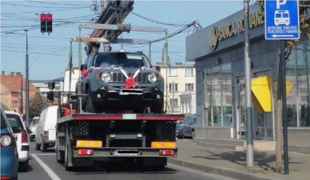 Tânăr de 28 de ani, suspectat că a FURAT trei mașini cu ajutorul unor auto-platforme / Autoturismele le-a dus la diferite centre de dezmembrări