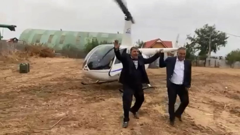VIDEO| Un primar din Dolj a fost dus la nuntă cu elicopterul: „A fost ambiția finului”