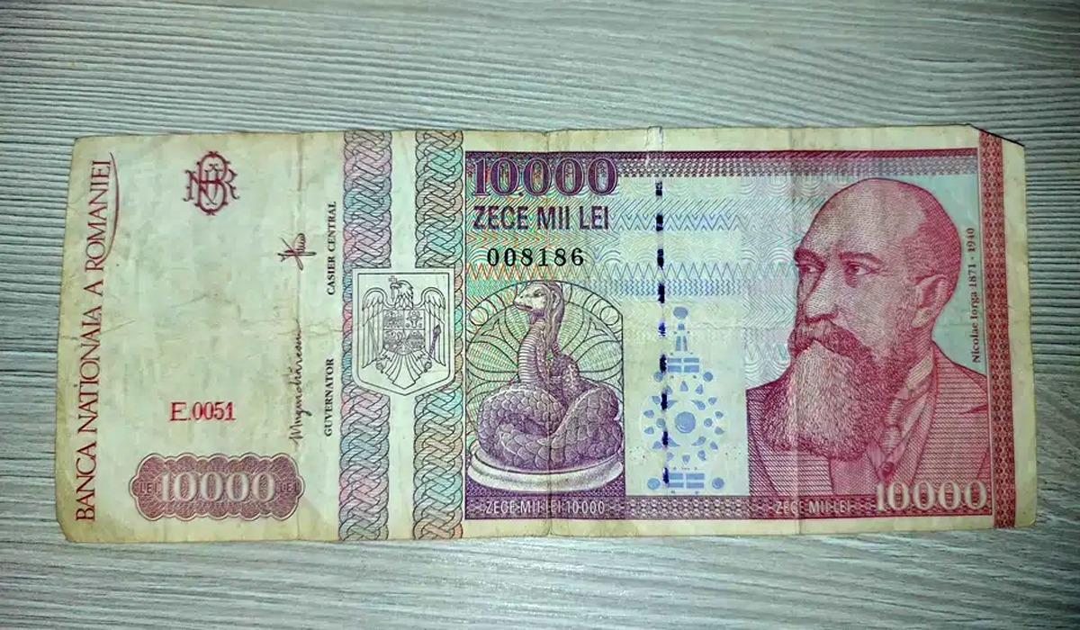 Ai așa ceva acasă?! Suma colosală cu care se vinde o bancnotă de 10.000 de lei cu chipul lui Nicolae Iorga