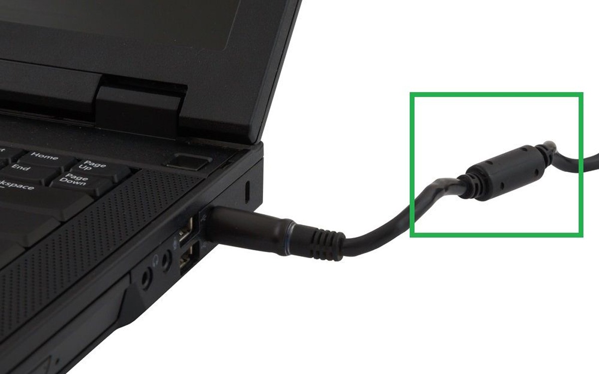 Ai observat că toate încărcătoarele de laptop au un cilindru negru? Care e motivul și ce rol are, de fapt