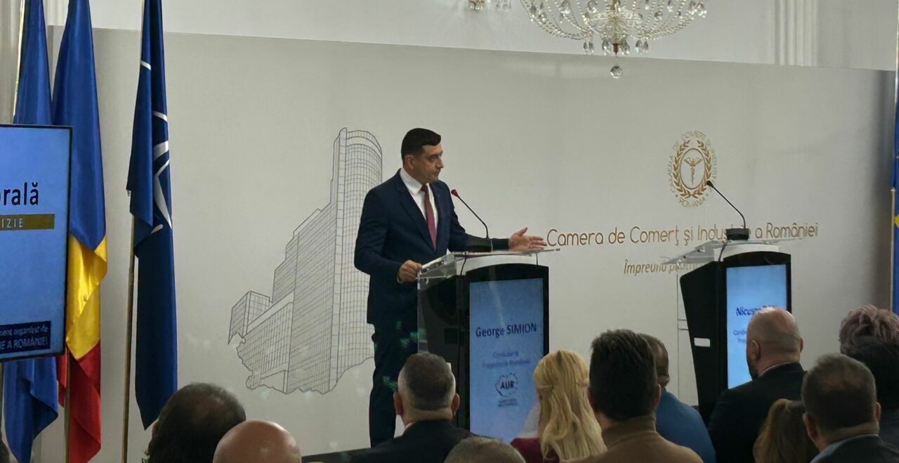 George Simion, față în față cu oamenii de afaceri, la CCIR / Nicușor Dan nu a venit. George Simion și-a prezentat diploma de BAC