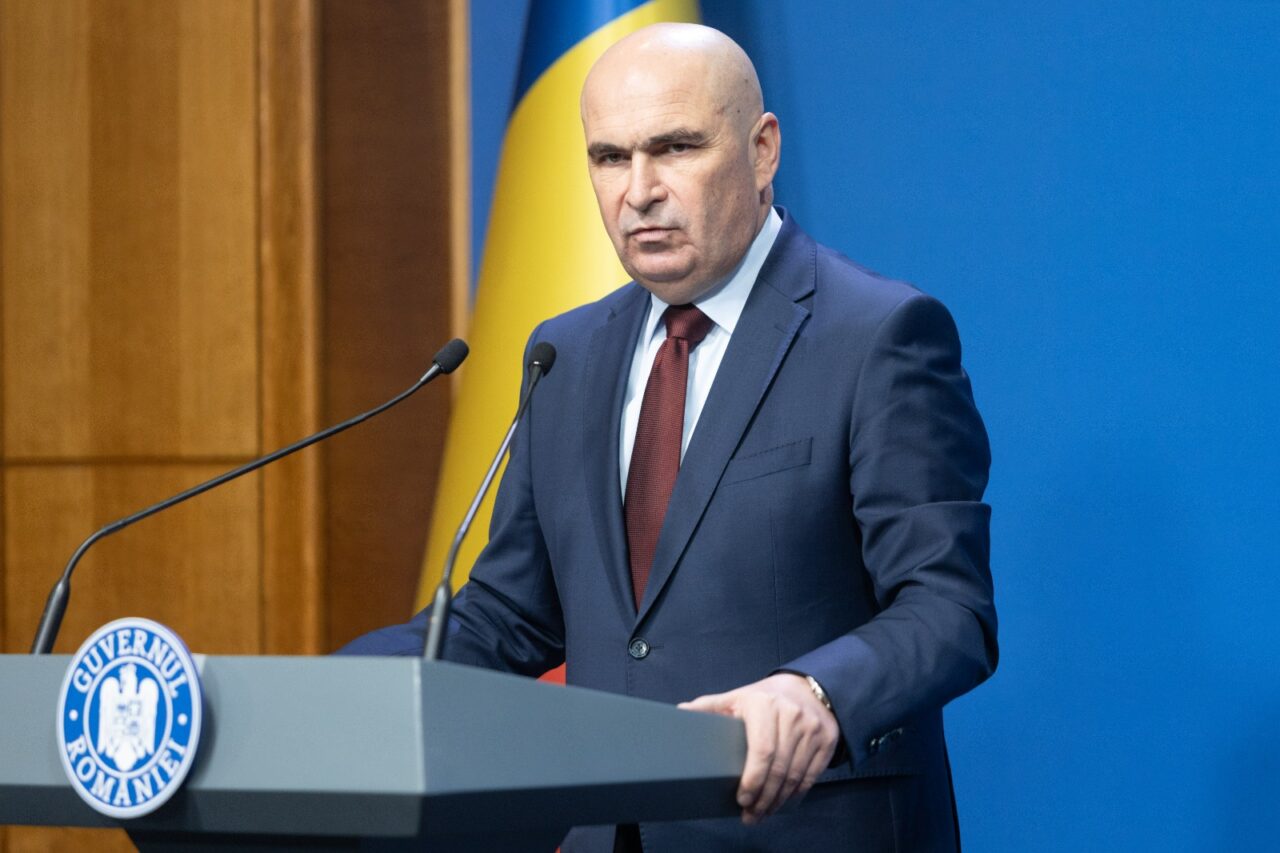Ilie Bolojan a anunțat creșterea cotei generale de TVA de la 1 august la 21%: „La cota redusă rămân medicamentele și alimentele”