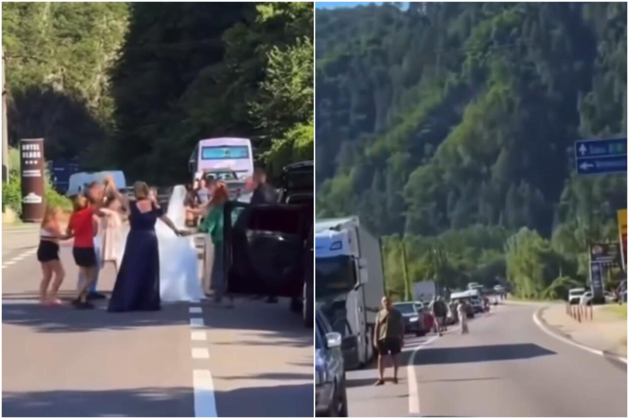 Imagini inedite. Un alai de nuntă blocat pe Valea Oltului a încins o horă direct pe șosea